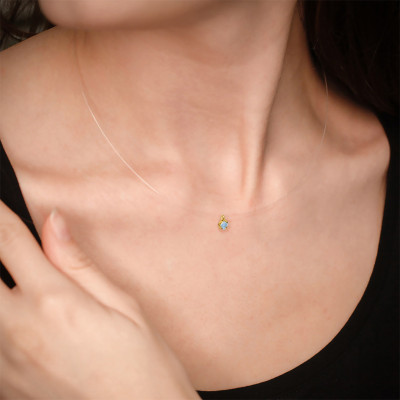 Collier fil nylon serti griffe, Aigue Marine et Or jaune 375 - Aurora