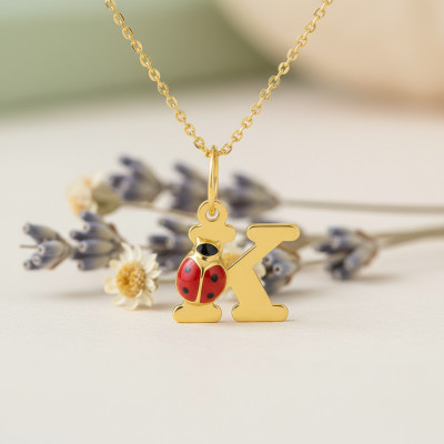 Pendentif initiale K et coccinelle, Or jaune 375 - Emanessence